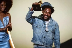 Kendrick Lamar lần đầu tiên giành giải "Bản thu của năm" với "Not Like Us". (Ảnh: Getty Images/TTXVN)