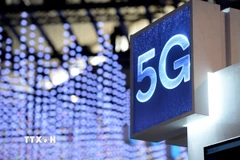 Biển dịch vụ 5G. (Ảnh: AFP/TTXVN)