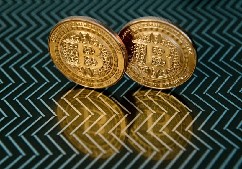 Đồng tiền kỹ thuật số bitcoin. (Ảnh: AFP/TTXVN)