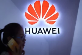 Logo của Huawei tại Triển lãm đồ điện tử quốc tế ở Bắc Kinh, Trung Quốc ngày 8/7/2018. (Ảnh: AFP/TTXVN)