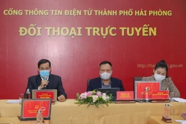 Phó Chánh Văn phòng Ủy ban Nhân dân thành phố Hải Phòng Phạm Anh Tuấn, Phó Giám đốc Sở Thông tin và Truyền thông thành phố Vũ Đại Thắng đồng chủ trì phiên Đối thoại. (Nguồn: haiphong.gov.v)