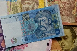 Đồng hryvnia của Ukraine đã bị mất giá 30%. (Ảnh: Reuters)