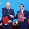 Thủ tướng Liên bang Nga Mikhail Mishustin kết thúc tốt đẹp chuyến thăm Việt Nam 2 Hai Thủ tướng ký Thông cáo chung về kết quả chuyến thăm chính thức Việt Nam của Thủ tướng Liên bang Nga Mikhail Vladimirovich Mishustin. (Ảnh: Dương Giang/TTXVN)