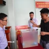 Người dân thành phố Biên Hòa bốc thăm vị trí đất tái định cư. (Ảnh: Công Phong/TTXVN)